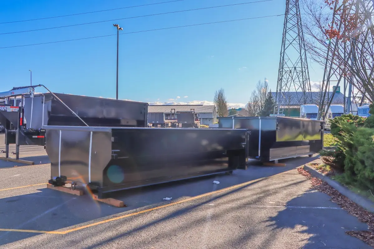 Roll-off dumpster ready for waste disposal at job site for 12 Yard Dumpster Rental in Veneta